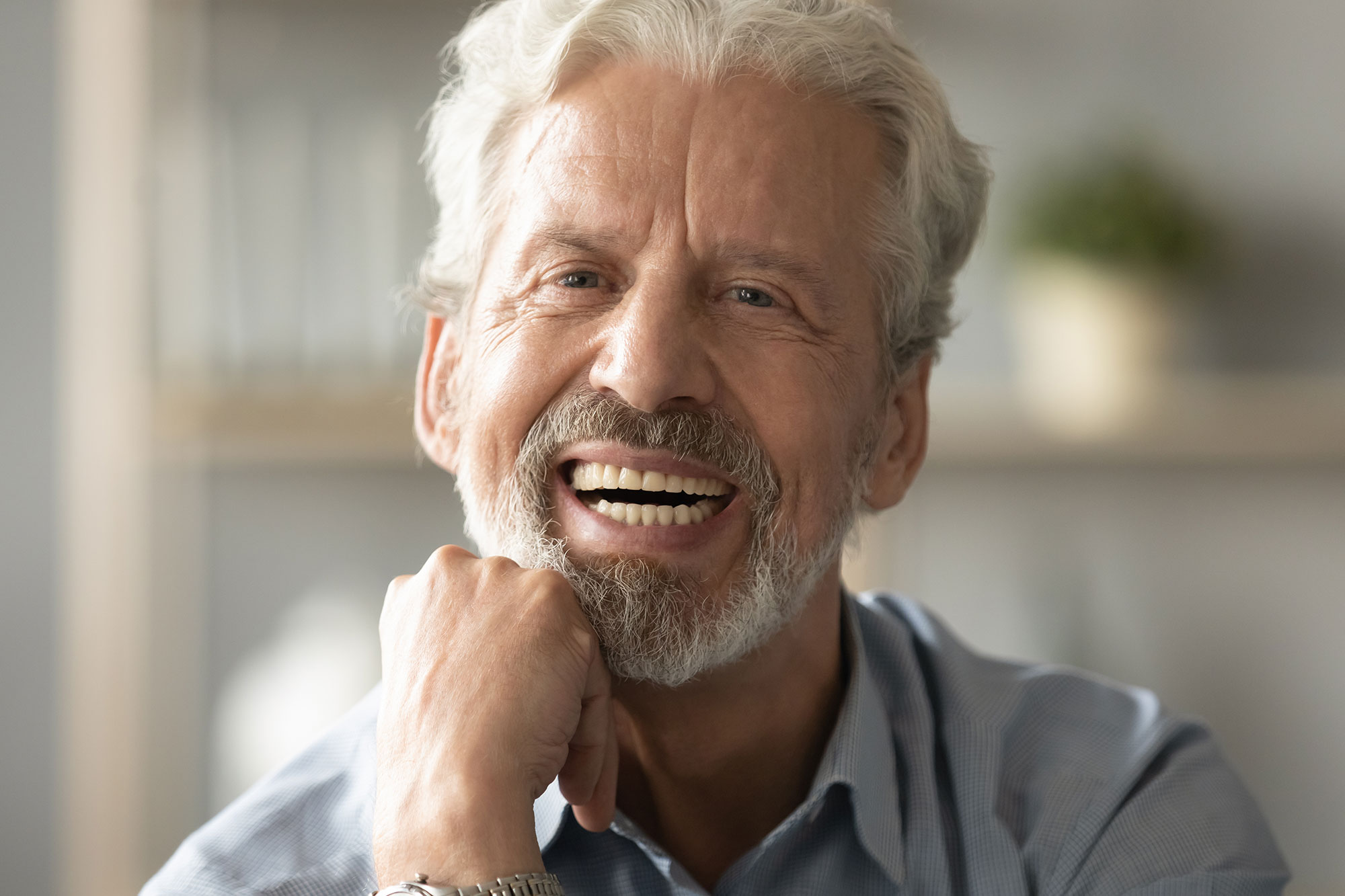 man with implant supported dentures Withers Perio Fairfax, VA